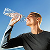 Man drinking a bottle of water