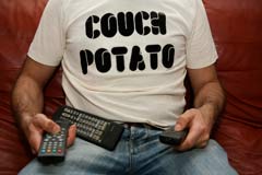 couch potato shirt with remotes around wearer