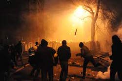 protestors throwing fire bombs