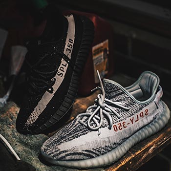 This is an image of the hyped shoes Yeezy 350's Beluga 2.0 and Core.