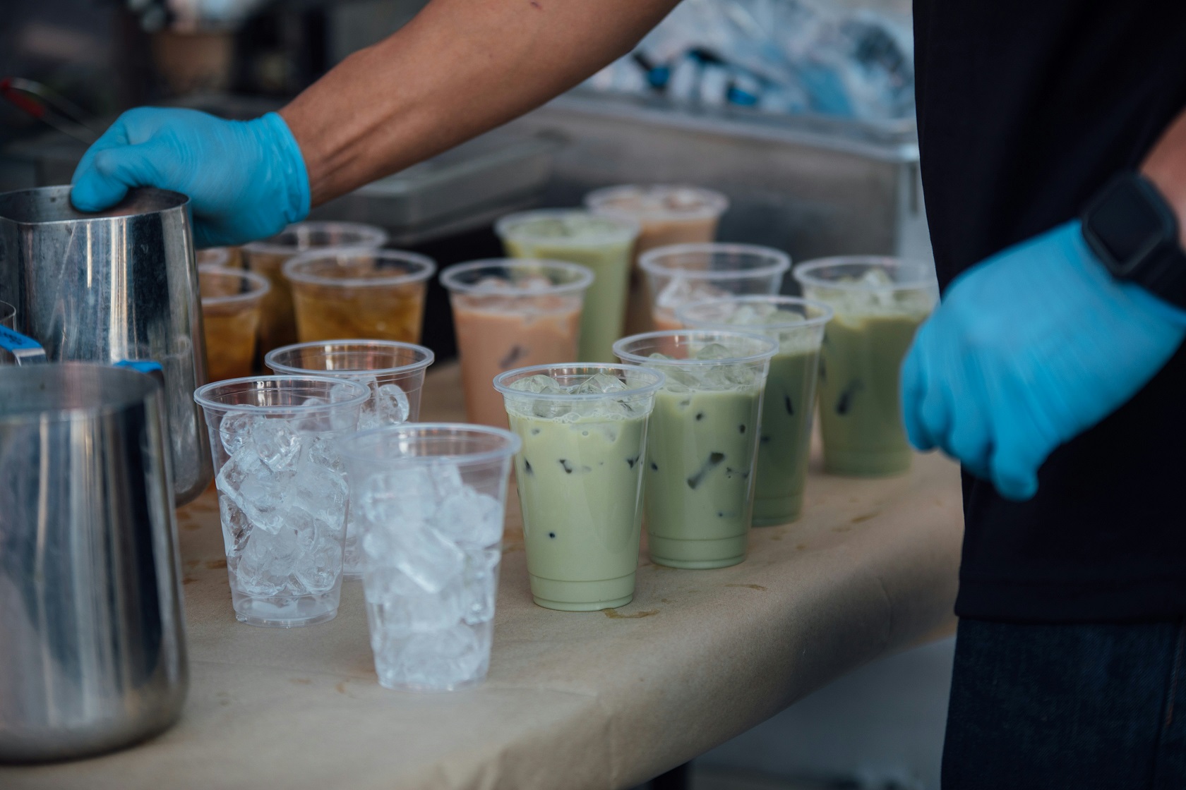 barista making drinks at a cafe