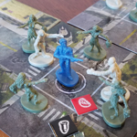 A post apocalyptic survivor is surrounded by zombies.