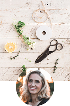 crafts behind blonde woman smiling