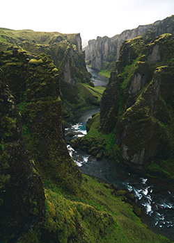 Green moutains with river running through