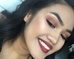 Rusted eyeshadow with dark red lipstick makeup look.
