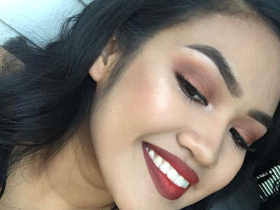 Rusted eyeshadow with dark red lipstick makeup look.