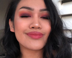 Sunset smokey eye with rose pink lips makeup look.