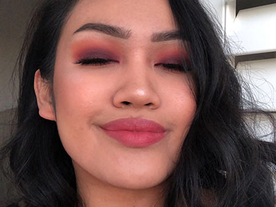 Sunset smokey eye with rose pink lips makeup look.