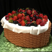 A cake that looks like a basket with real fruit on top. Click here for a larger picture.