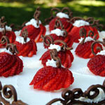 An elegant cake with cut strawberries on top. Click here to go to the all occasion cake section.