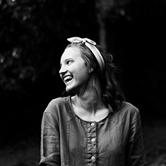 black and white laughing senior portrait