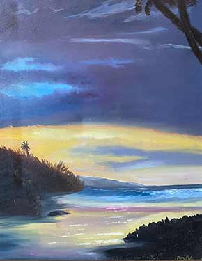 Lat light of the day over a calm tropical coast.