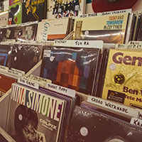 a picture of records on display at a store
