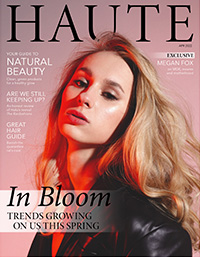 HAUTE magazine cover with headlines and a blonde woman in red light pouts toward the camera