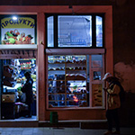 The street store view of the front dore from the opposite side of the street. 