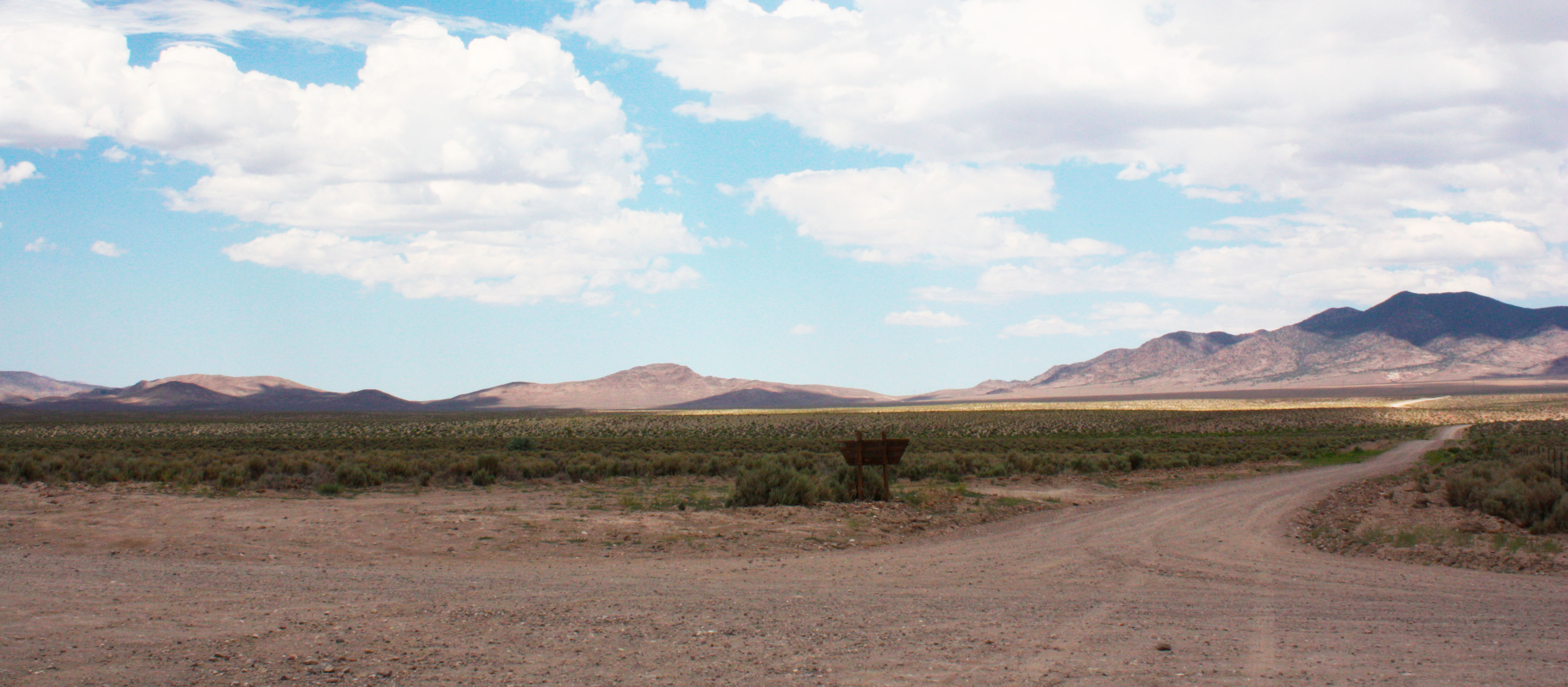 Image of desert view with mountain range in background outside of Bodie.