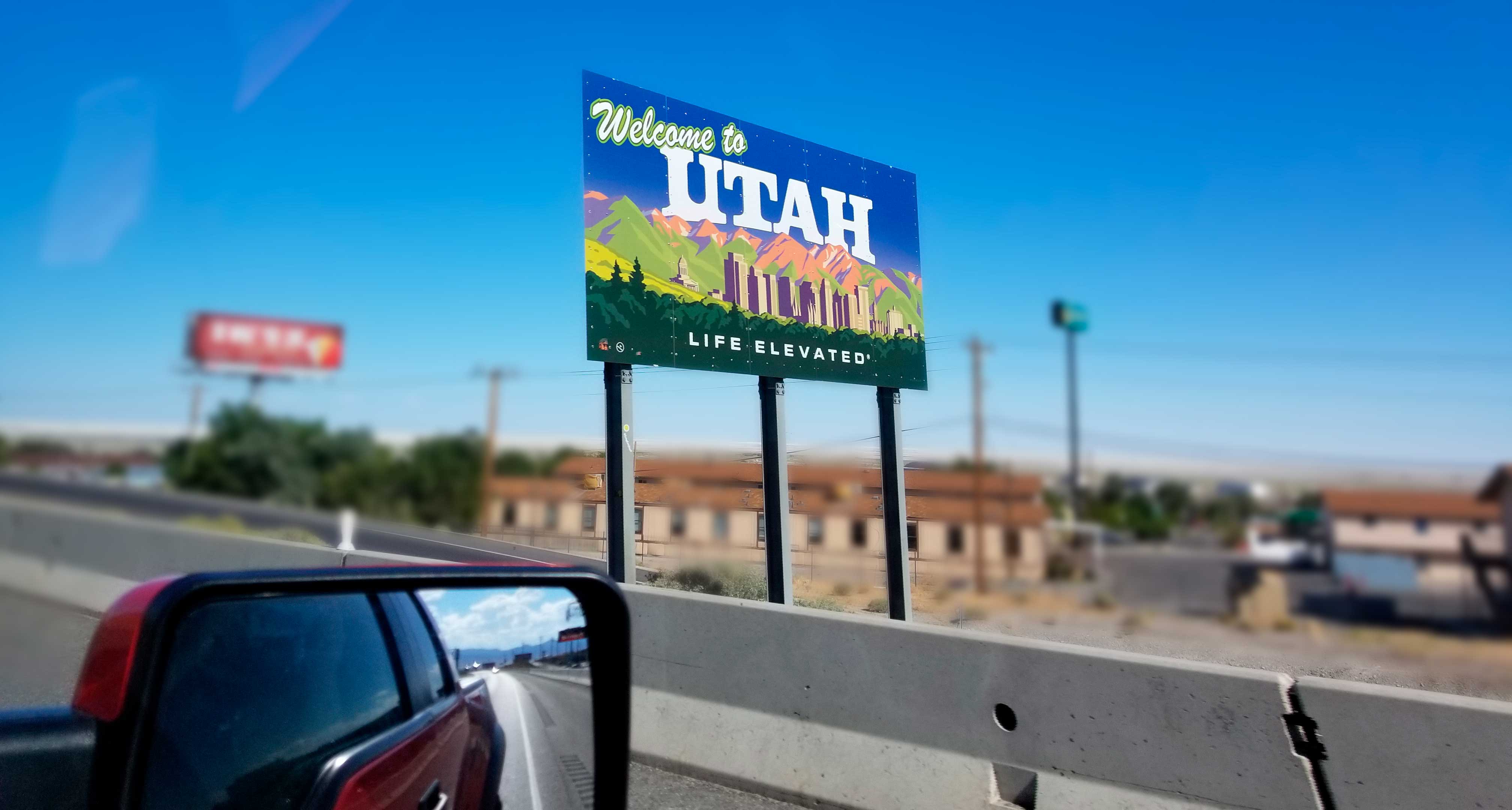 Image of Welcome to Utah sign on highway