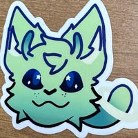 Sticker with a drawing of a green space cat