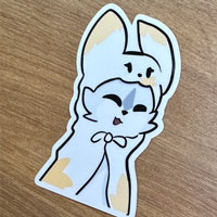 a Cartoon cat drawing wearing a blanket around them