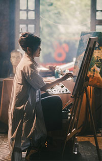Woman painting in an art studio