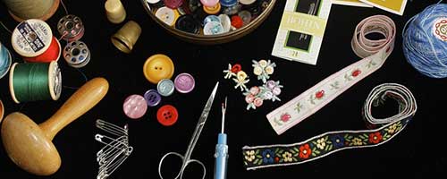 a layout of sewing supplies