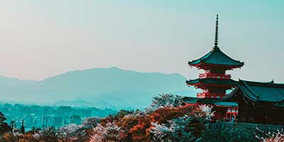 A Japanese padoga on a hill
