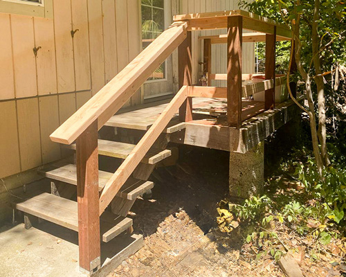 Repaired Wooden Staircase and Rail