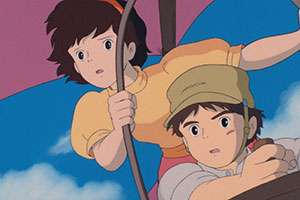 a young boy and girl in a flying contraption in the sky