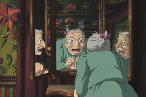 old woman looking suprised in mirror