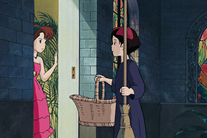 a young girl delivering a basket to another young girl at the door