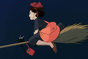 a young witch flying a broom