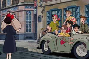 a young witch approached by a car full of teenage boys