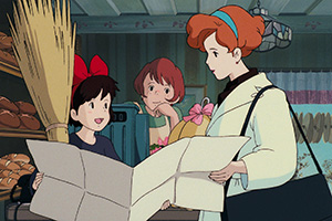 a young girl speaking with an older woman