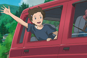 a young girls waves out of a car window