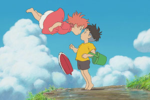 a young girl floats in air with face up against a young boys