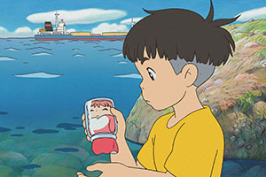 a young boy finds a goldfish in a bottle by the shore