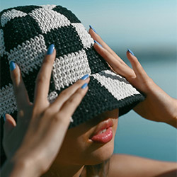 Woman wearing a crochet bucket hat