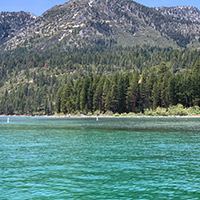 The emerald water of Lake Tahoe and the shoreline beyond