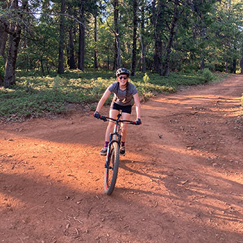 bike rider approaching on trail