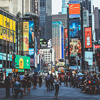 Visitors in Times Square take photos