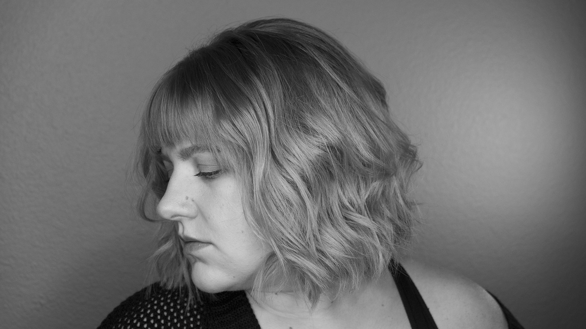 black and white portrait of Angie Reed
