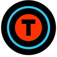 A bullseye board that has the letter T in the middle as the bullseye