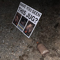 The Jug sitting next to the Jug Sign