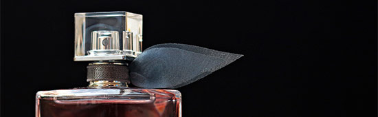 An artistic shot of a perfume bottle