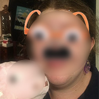 A blurred photo of Tessa Cohlan with a disguise photo-edited onto her face.