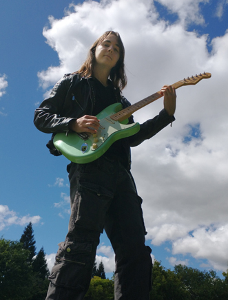 picture of me holding a guitar