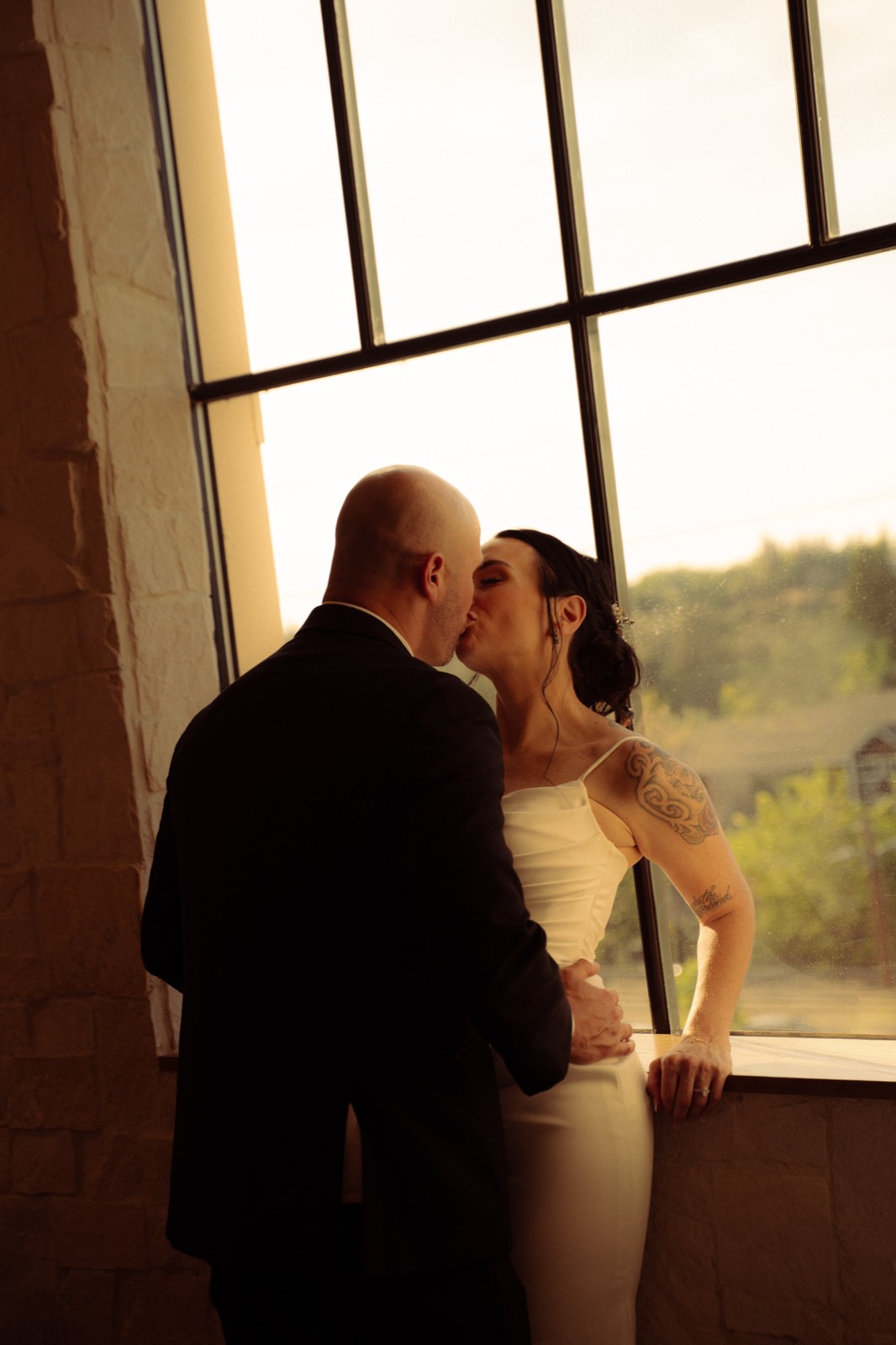 A romantic, naturally lit portrait of a couple together.