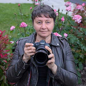 Photo of the owner/photographer holding her camera