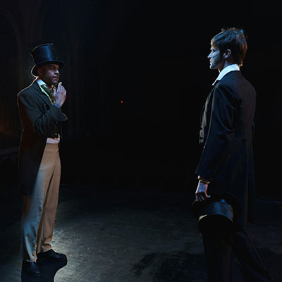 Two elegantly dressed men from the 1800s.