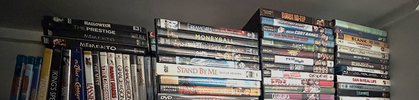 A bookshelf full of DVDs and Blu-rays, full of a variety of colors